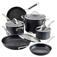 The Anolon X 10-Piece Hybrid Nonstick Cookware Set includes various black PFOA-free pots and pans with silver handles and glass lids, featuring the innovative SearTech™ cooking surface.