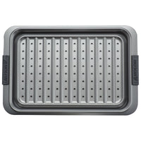 A rectangular Advanced 10 x 15-Inch Crisper Pan Set with a nonstick finish and removable crisper rack, seen from above. The metal pan features handles on both sides, each labeled Anolon.