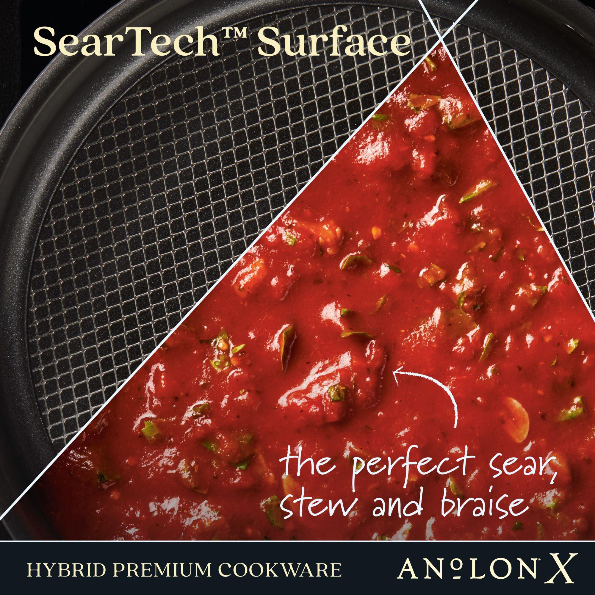 Close-up of a 3.5-quart Anolon X Hybrid Nonstick Induction Sauté Pan. One side shows the mesh with SearTech™ Surface, indicating its nonstick excellence, while the smooth half holds red sauce with herbs, labeled as perfect for searing, stewing, and braising. Branding reads “ANOLON X Hybrid Premium Cookware.”.