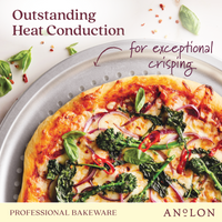 A pizza topped with vegetables is displayed on a 14-Inch Aluminized Steel Perforated Pizza Pan by Pro-Bake, ideal for thin crust pizzas. The text highlights Outstanding Heat Conduction for exceptional crisping and the quality of Professional Bakeware. Basil leaves and chili flakes are scattered around.
