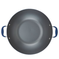 A top view of a round, grey 14-Inch Wok with Side Handles by Advanced Home shows blue handles on both sides. The non-stick surface of this hard-anodized flat bottom pan is empty against a white background.