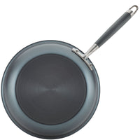 Presenting the Advanced Home 3-Piece Nonstick Cookware Set: This hard anodized sauté pan features a smooth, dark non-stick surface with a slightly raised circular design for optimal heat distribution. It includes a long handle with a silver end and convenient hanging loop.