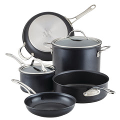 The AnolonX 7-Piece Hybrid Nonstick Cookware Set features a sleek black design with a non-stick finish, including two frying pans, a saucepan with lid, a sauté pan with lid, and a large pot with lid. Each piece is equipped with metal handles and glass-topped lids for convenient viewing during cooking.