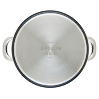 A top-down view of the Anolon X stainless steel pot lid with dual handles shows the brand name engraved on its brushed finish, indicating specifications. This circular lid pairs with the 10-Piece Hybrid Nonstick Cookware Sets PFOA-free SearTech™ cooking surface for enhanced performance.