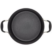 A top-down view of the Advanced Home 10-Quart Stockpot, featuring an empty, non-stick interior designed for even heat distribution. This round cookware item comes with two wide black stockpot-style handles on either side, securely attached with metal fixtures, making it ideal for cooking.