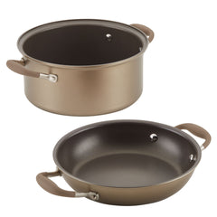 Introducing the bronze-colored Round Two Step Meal Set by Advanced Home. This hard-anodized cooking set features a 5-quart Dutch oven and a shallow pan, both equipped with sturdy handles and a glossy interior finish, perfect for all your culinary needs.