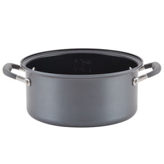 The hard-anodized, gray nonstick cooking pot is a feature of the versatile Round Two Step Meal Set by Advanced Home. This deep 5-quart Dutch oven is equipped with two handles and interior measurement markings, making it ideal for simmering or boiling. It is elegantly displayed against a pristine white background.