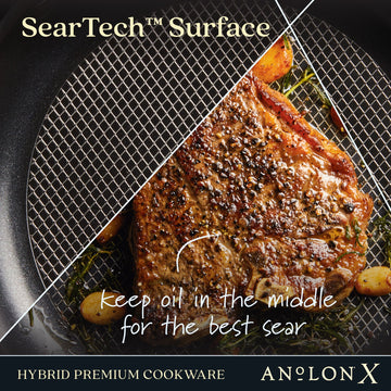 Close-up of a steak searing on a SearTech™ surface hybrid premium cookware by AnolonX.