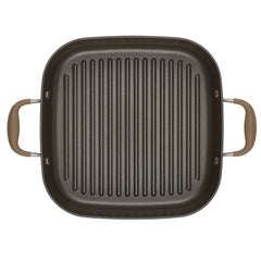 The Square Two Step Meal Set by Advanced Home provides exceptional nonstick performance with its square grill pan featuring raised ridges and beige handles. Its surface, designed with parallel grooves, is ideal for grilling, while its straightforward and practical design makes it stove-to-oven ready for versatile cooking tasks.