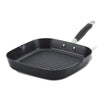An 11-Inch Deep Square Grill Pan by Advanced Home featuring a black, nonstick ridged cooking surface and a metallic handle with a black grip. The pan's high sides make it ideal for stovetop use.