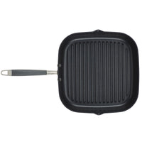 The 11-Inch Deep Square Grill Pan by Advanced Home features a nonstick, ridged cooking surface in black, displayed against a white background. It has a metallic handle with a black grip.