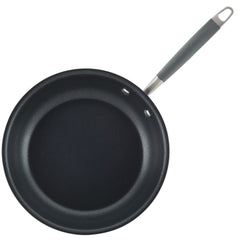 An essential piece from the Advanced Home 11-Piece Cookware Set is a black non-stick frying pan crafted from hard anodized aluminum. It features a long handle with a convenient hole for hanging, positioned so that the handle extends to the right.