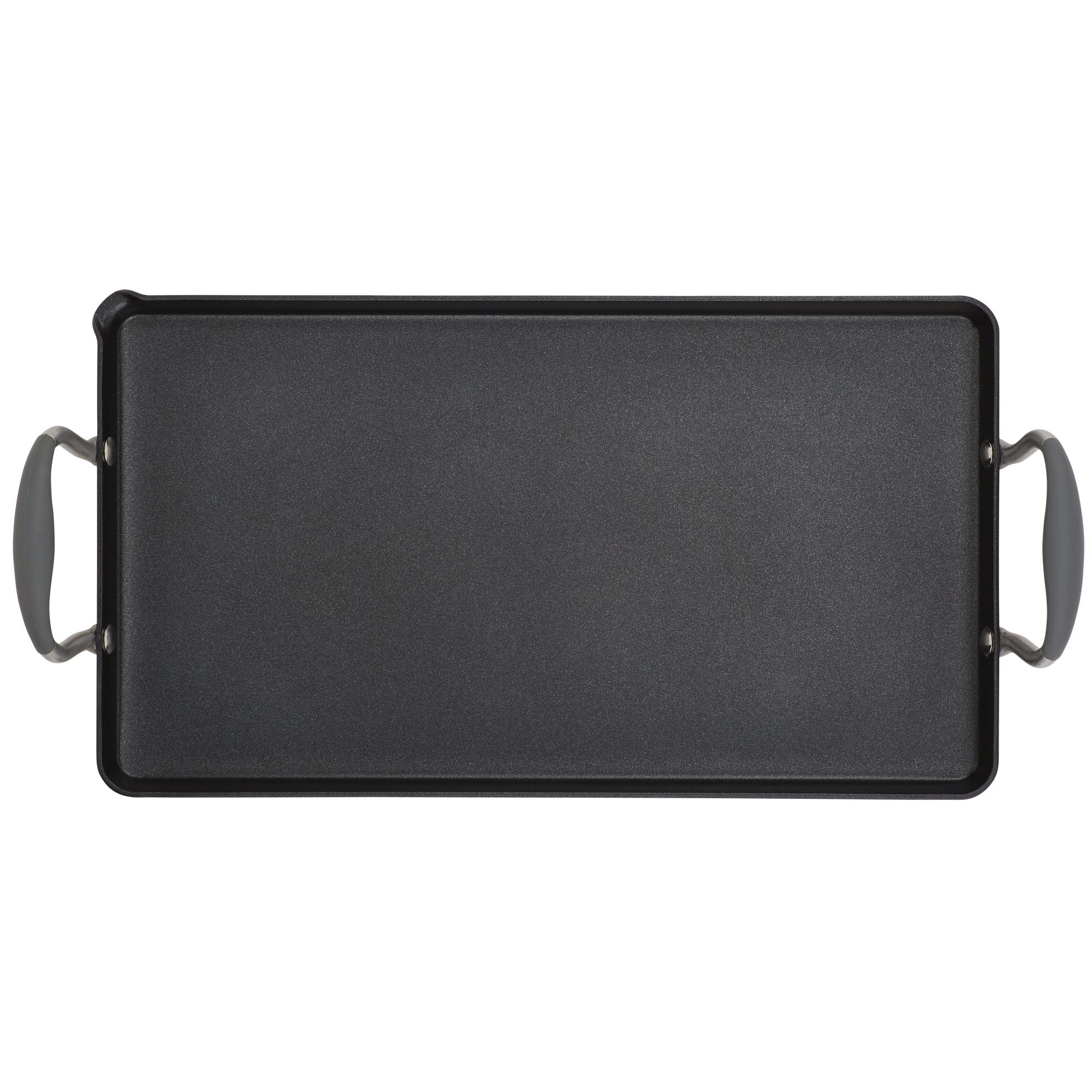 The Advanced Home 10 x 18-Inch Double Burner Griddle with Multi-Purpose Rack is a rectangular black nonstick griddle featuring SureGrip handles on both sides, shown from above against a white background.