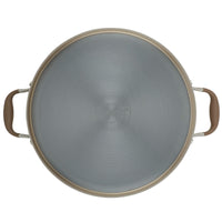 A top view of a sizable, gray 7.5-Quart Stockpot by Advanced Home reveals two brown handles on each side. The surface features a circular brushed metal texture, noted for its excellent heat distribution, with the brand name etched in the center to highlight its premium quality akin to a wide stockpot.