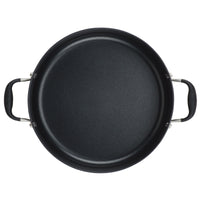 An overhead view of the large black Advanced Home 7.5-Quart Stockpot, featuring dual riveted handles for secure grip on each side. Its smooth, round interior is designed to provide excellent heat distribution, making it ideal for a wide range of cooking needs.