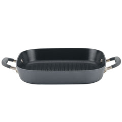 Introducing the Square Two Step Meal Set by Advanced Home: a square, dark gray grill pan with a ribbed cooking surface and dual black handles, perfect for stovetop grilling. It offers outstanding nonstick performance and features robust metallic handle connections, making it an essential component of any combo cookware set.