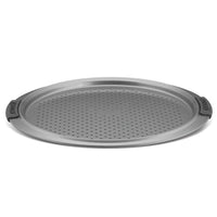 Introducing the Advanced 13-Inch Pizza Crisper— a round, non-stick pan with perforations for optimal airflow. It features two black handles on opposite sides for easy handling. Its sleek metallic surface is designed for even baking and is oven safe.