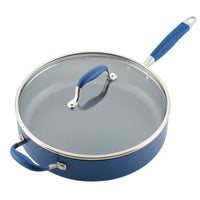 Introducing the 5-Quart Sauté Pan with Helper Handle from Advanced Home: a sleek blue pan that features a glass lid and nonstick surface. It comes designed with a long handle, complemented by an additional short helper handle on the opposite side for your convenience.