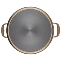 Top view of a 10-Quart Stockpot by Advanced Home, featuring a round, metallic gray design with a gold-colored rim and two ergonomically shaped brown side handles. The nonstick surface showcases circular brushed patterns for excellent heat distribution and even cooking.