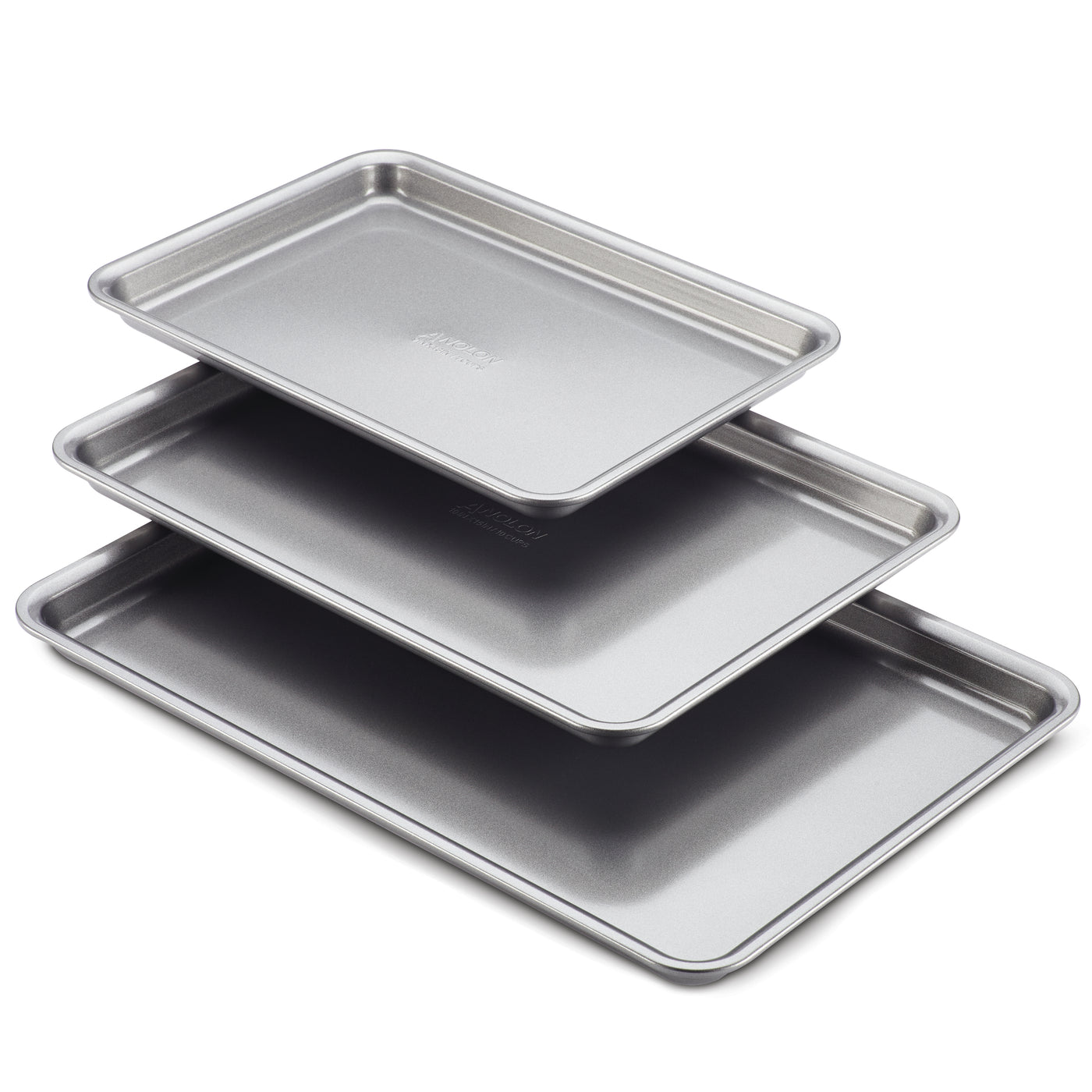 The 3-Piece Gourmet Cookie Pan Set by Gourmet consists of three stainless steel baking trays, ideal for homemade cookies, stacked with each measuring slightly larger than the one above it. These nonstick baking pans feature a smooth, shiny surface and raised edges.