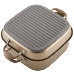 Introducing the Square Two Step Meal Set by Advanced Home: a square, metallic grill pan with a ridged lid and side handles for versatile cooking. This pan boasts nonstick performance and features a sleek, modern design in muted gold, making it stove-to-oven-ready and an essential piece for any kitchen combo cookware set.