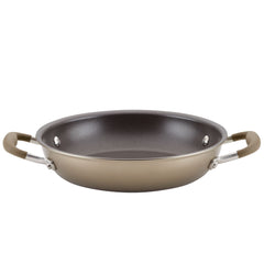 The Round Two Step Meal Set by Advanced Home features a hard-anodized non-stick frying pan with a sleek design that includes dual handles on either side. It showcases a smooth black interior and a matte brown exterior, ideal for crafting delicious meals.