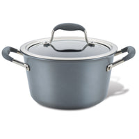 The Advanced Home 4.5-Quart Tapered Saucepot is a gray, stainless steel saucepot that comes with a glass lid featuring a metal rim and handle. It has black handles, and its sturdy, nonstick design makes it perfect for gourmet sauce-making and various cooking needs.