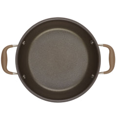 Top view of an empty Round Two Step Meal Set by Advanced Home, featuring a hard-anodized dark gray non-stick surface and beige handles on both sides, isolated on a white background.