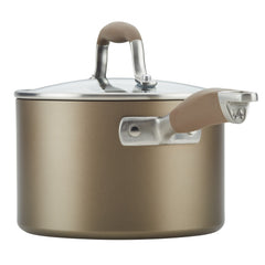 Introducing a key piece from the Advanced Home 11-Piece Cookware Set: a spacious saucepan in a striking bronze hue, crafted from durable hard anodized aluminum. It features a sleek stainless steel lid and handle, enhanced with a soft beige grip for added comfort and adorned with an elegant silver emblem near the base of the handle.