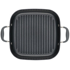 The Square Two Step Meal Set from Advanced Home is depicted from above, highlighting its nonstick performance with raised ridges. This black grill pan features two gray handles on each side, expertly crafted for effortless transitions from stove to oven.