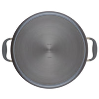 A top view of the 10-Quart Stockpot from Advanced Home reveals its excellent heat distribution, featuring dual gray handles on each side. The center is slightly textured, and the pot's dark gray metal construction makes it ideal for stovetop use.