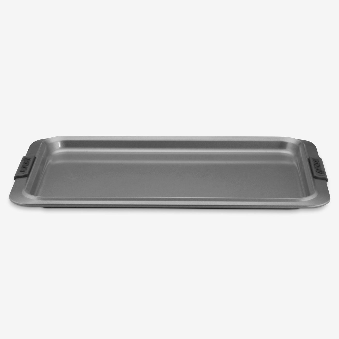 The Advanced Cookie Sheet with Silicone Grips is a rectangular, non-stick pan designed for even heat distribution, featuring raised edges and silicone grips on the sides, all displayed against a plain white background.