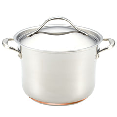 Introducing the Nouvelle Luxe 11-Piece Mixed Metals Cookware Set: a stainless steel cooking pot complete with dual side handles and a lid, elegantly reflecting the charm of copper cookware. The pot boasts a polished finish and subtle copper accents at its base, while the lid is crafted with a gently curved handle on top for effortless lifting.