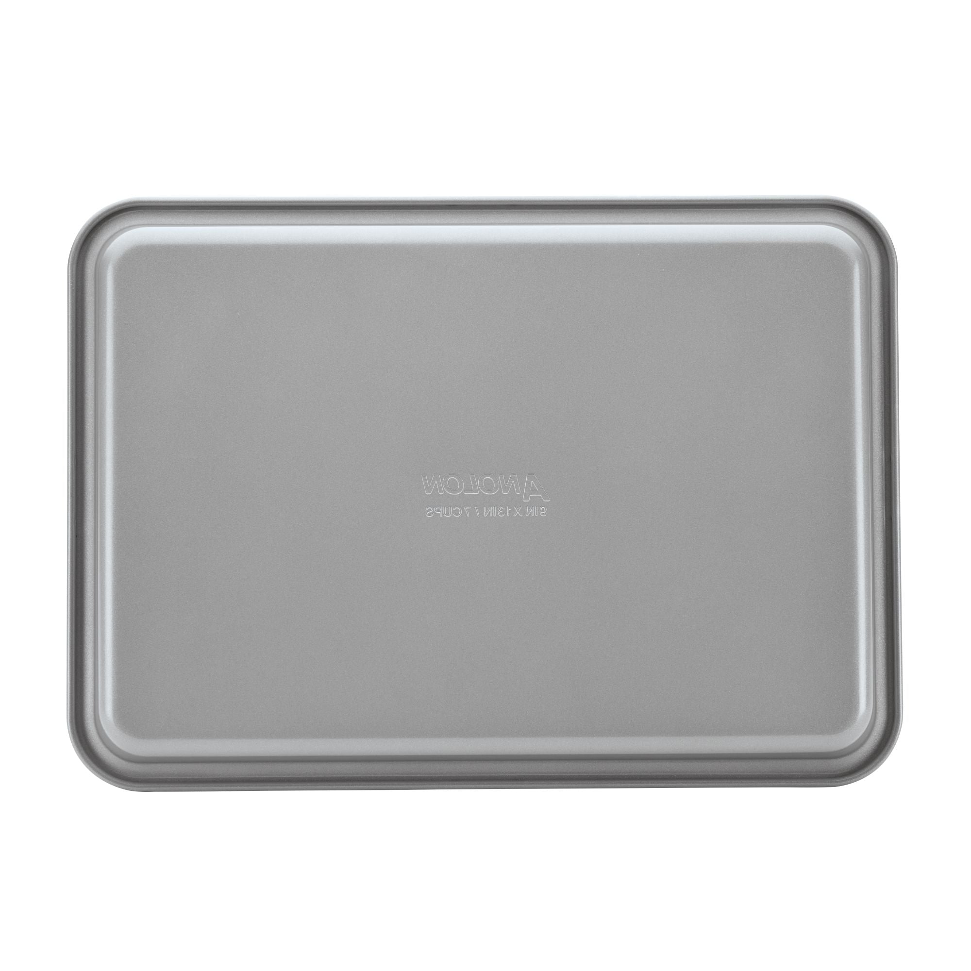 Introducing the 3-Piece Gourmet Cookie Pan Set by Gourmet, featuring rectangular, gray pans with a slightly raised edge. Each pan boasts a smooth, reflective surface that ensures a nonstick finish, making it perfect for baking homemade cookies or roasting savory dishes.