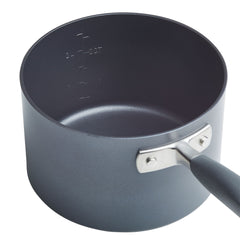 A large gray saucepan from the Advanced Home 11-Piece Cookware Set, made from hard anodized aluminum and featuring a shiny metal handle, includes measurement markings inside for both liters and quarts. This essential nonstick cookware piece is empty yet has a smooth surface ideal for all your cooking needs.