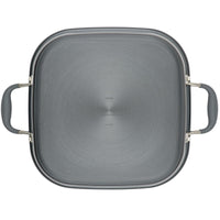 A top-down perspective of the Square Two Step Meal Set by Advanced Home reveals a square, anodized cooking pan with rounded corners and two black handles on either side. This versatile cookware features a smooth gray surface designed for exceptional nonstick performance.