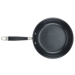 A top-down view of an 11-Piece Cookware Set from Advanced Home reveals a nonstick frying pan, an essential piece of cookware. It boasts a gray, smooth surface crafted from hard anodized aluminum and features a black handle with a hole for easy hanging.