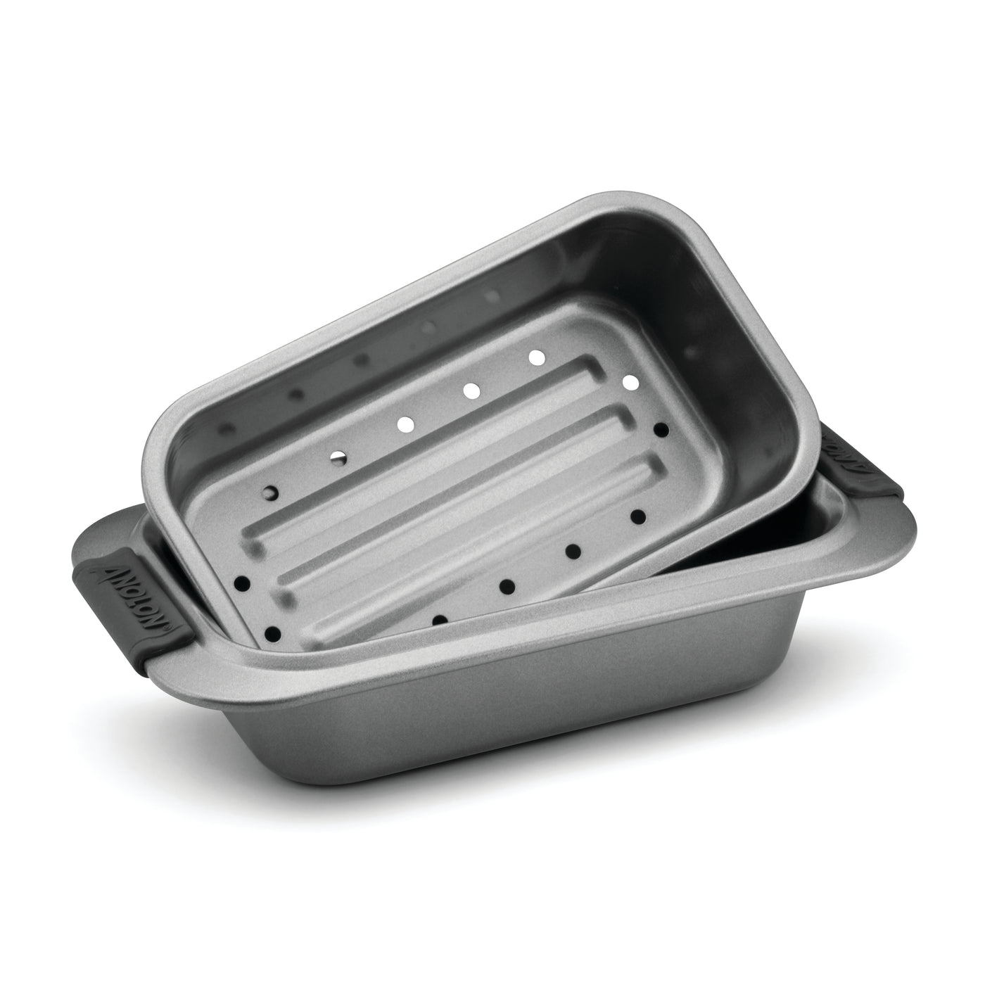 Introducing the 2-Piece Loaf Pan Set by Advanced, featuring two stacked dark gray baking pans from our nonstick bakeware collection. The top pan is designed with holes for draining, similar to a drip pan insert, while the bottom pan remains solid. Both pieces include convenient side handles for easy handling.
