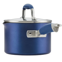 Introducing the Advanced Home 2-Quart Straining Saucepan, featuring a sleek blue design and hard-anodized durability. This nonstick saucepan comes with a matching lid, both adorned with shiny metallic finishes and equipped with metal handles covered in blue grips for added comfort.